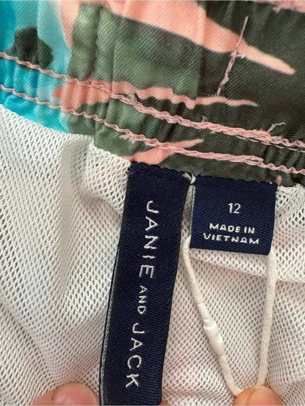 Janie and Jack Palm swim trunks size 12. Green, blue and peach. Great shape!